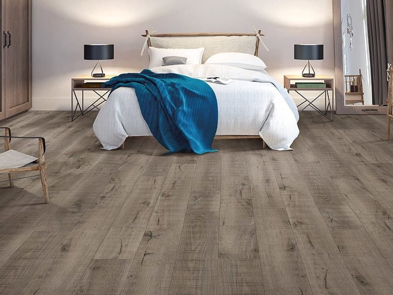 Luxury vinyl flooring in a modern bedroom